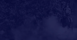 A person wearing a helmet rides a horse along a path bordered by dense trees, with a misty atmosphere partially obscuring the scene. The dark blue overlay adds an air of mystery, capturing the spirit of the 30 Days challenge.