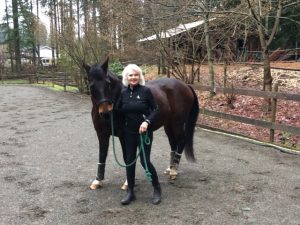 Strides member Colleen with her horse Prestley.