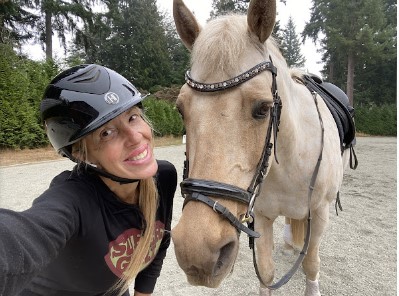 Ursula posing with her horse.
