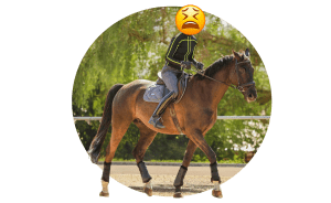 Rider improving dressage basics with a horse in the arena
