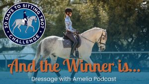 A woman rides a gray horse in an arena. A blue logo with a horse and rider reads Sitting Trot Challenge: 30 Days. Text at the bottom says, And the Winner is... Dressage with Amelia Podcast—celebrating the Sitting Trot Challenge Winners!.