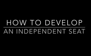 White text on a black background reads: HOW TO DEVELOP AN INDEPENDENT SEAT, with HOW TO DEVELOP above a horizontal line and AN INDEPENDENT SEAT below it—perfect for horse riding and equestrian training enthusiasts.